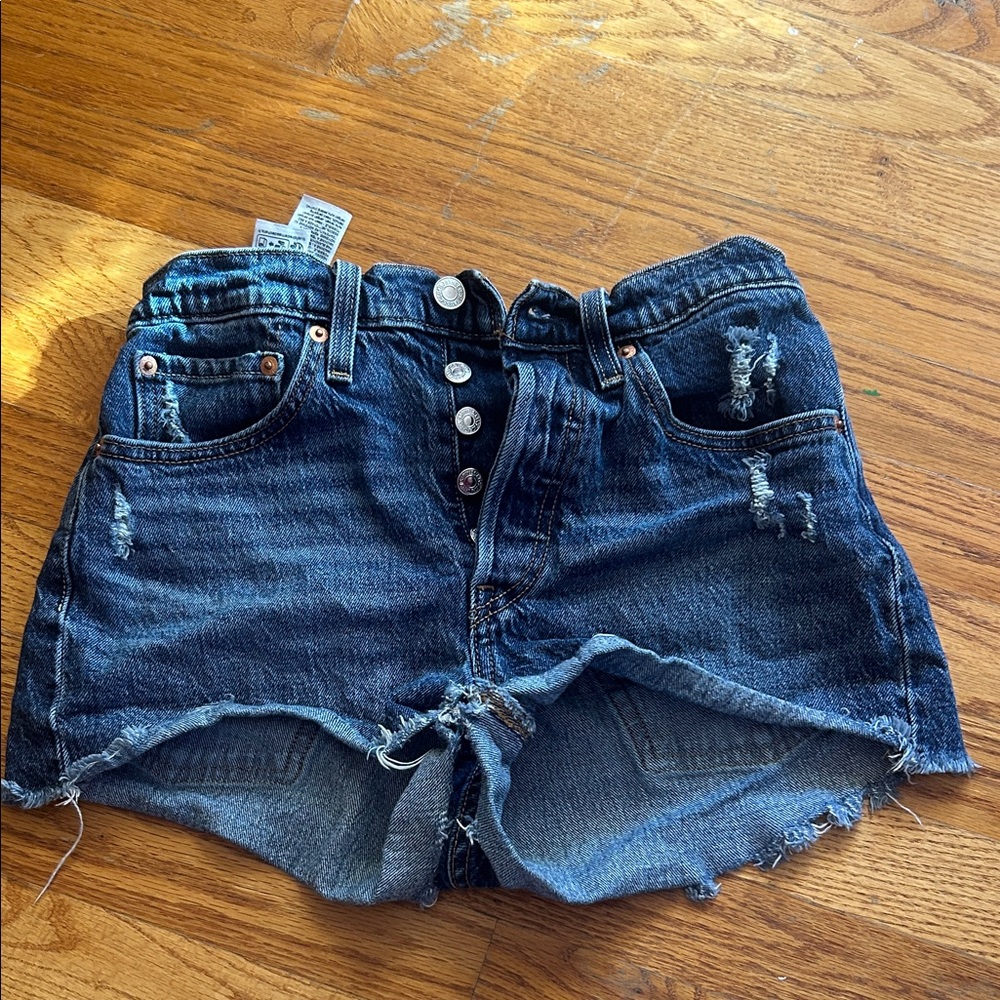 Levi’s 501 Dark Blue Distressed Jean Shorts